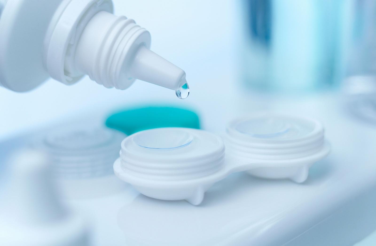 Removing contact lenses before sleeping and putting them into a contact lens case with contact lens solution.