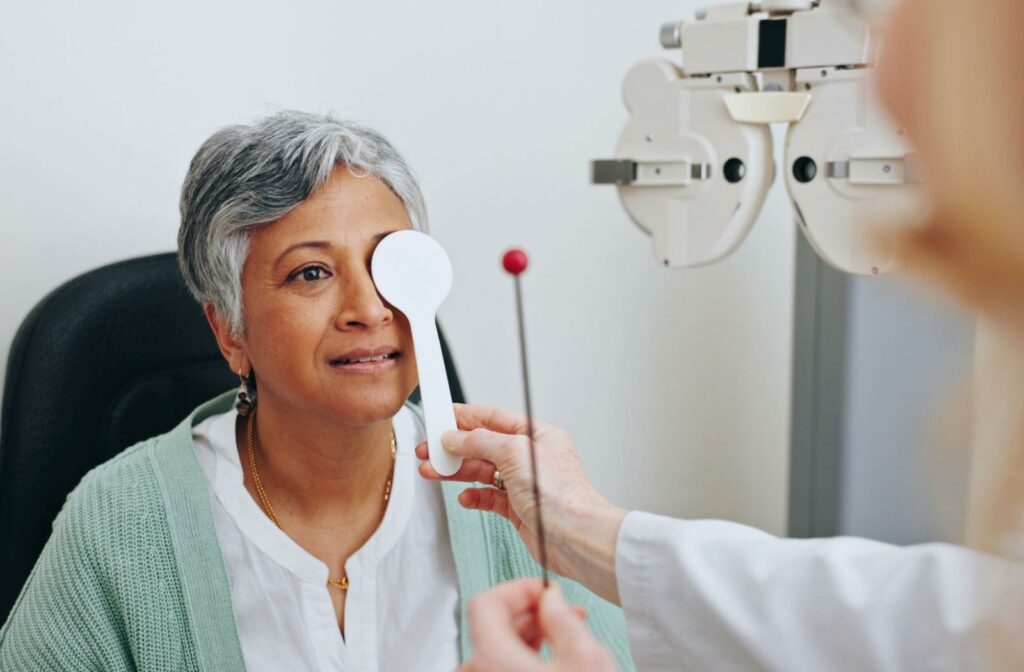An eye doctor testing a patient's eye dominance.